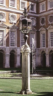The Portland stone lamp base by Gary Churchman, shown in place in the Fountains Court, Hampton Court, Surrey in August 1995. Photograph by Gary Churchman.