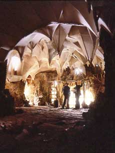 A photograph of the interior of the Grotto at Painshill Park by Fred Holmes, June 2006. The picture shows the new stalactites of lath and plaster on a frame of green oak. Copyright: Fred Holmes.